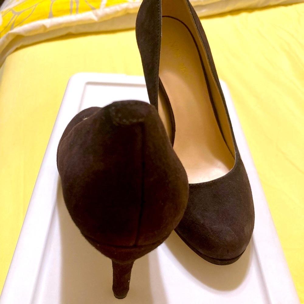 Chocolate brown pumps.